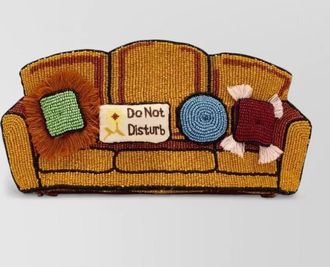 Staud beaded clutch bag sofa inspired design