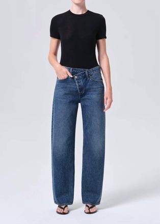 A Gold E Arc Criss Cross Jean In Blue