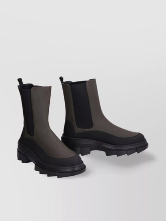 Stuart Weitzman chelsea boots with lug sole and pull tab