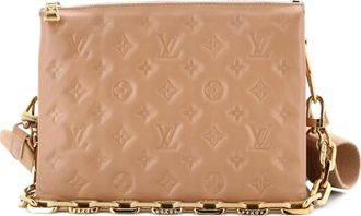 Louis Vuitton Coussin Bag Monogram Embossed Lambskin PM crossbody bag - women - Calf Leather - One Size - Neutrals