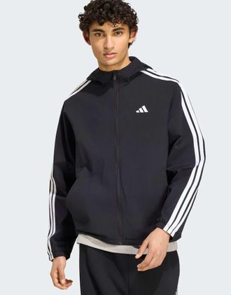 adidas Essentials - Giacca a vento nera e bianca 3 con strisce-Nero