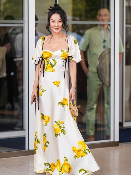 jessica wang wearing white dress with yellow flowers