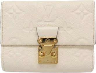 Louis Vuitton Pre-owned M&eacute;tis Compact Portemonnee M81071 - Dames - Vintage Accessoires - Beige - ONE Size - Leer - Vintage