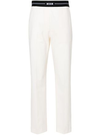 Msgm logo-waistband tapered trousers - Neutrals