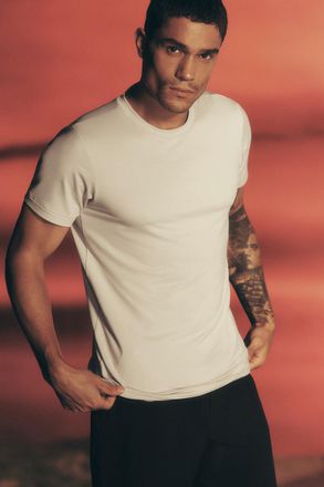 Alo | Conquer Reform Crewneck Short Sleeve Top in Bone Beige, Size: Medium