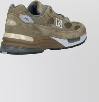 New Balance suede and mesh low top sneakers