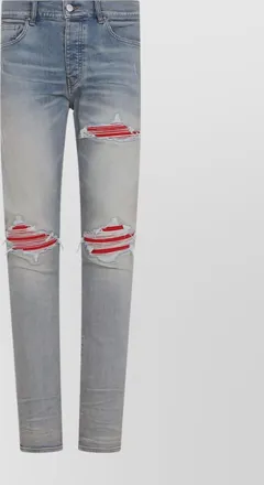 Amiri denim distressed low-rise skinny jeans