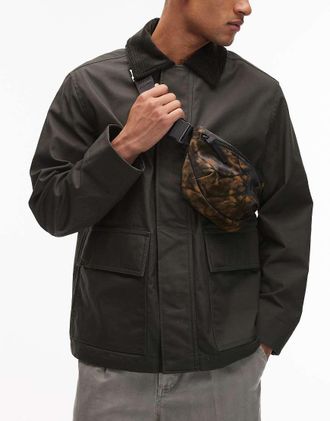 Rains Valera 13180 - Marsupio impermeabile marrone con stampa effetto fango