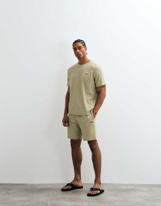 HUGO BOSS Pantaloncini a nido dape kaki chiaro con stampa del logo in coordinato-Verde