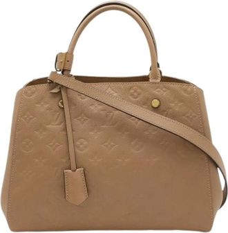 Louis Vuitton Pre-owned Montaigne Monogram Empreinte Handtas - Dames - Vintage Handtas - Bruin - ONE Size - Leer - Vintage
