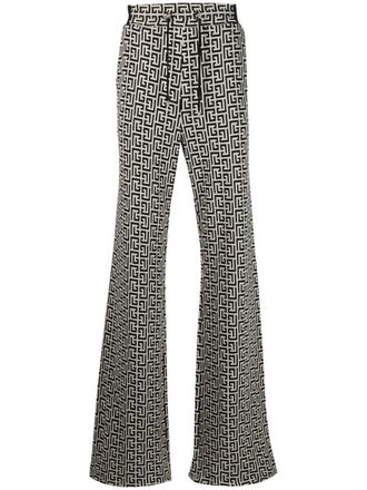 Balmain monogram-motif trousers - men - Cotton - S - Neutrals