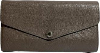 Louis Vuitton Portafoglio bi-fold Monogram Empreinte Pre-owned - - Pre-owned - Donna - Marrone - ONE SIZE