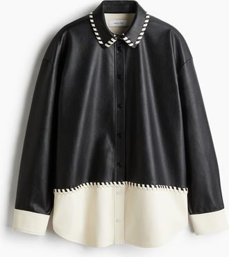 H&M Beschichtete Bluse mit Colourblocking - Schwarz