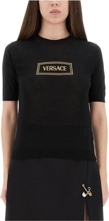 Versace Fijngebreide top met korte mouwen - Dames - Ronde hals truien - Zwart - M - Wol - Truien & Vesten
