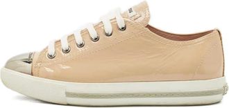 Miu Miu Sneakers in pelle verniciata - Toni neutri