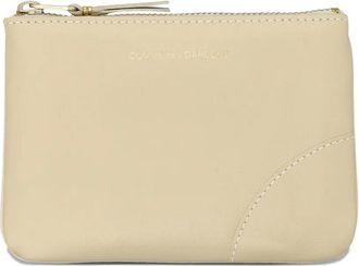 Comme Des Garçons Portamonete con logo goffrato e zip - Giallo