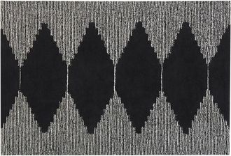 Beliani Rug BATHINDA Black/ White 140 x 200 cm Cotton