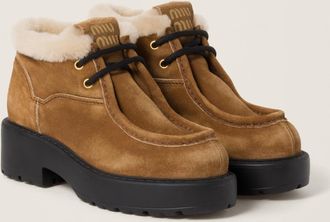 Miu Miu Faded suede booties