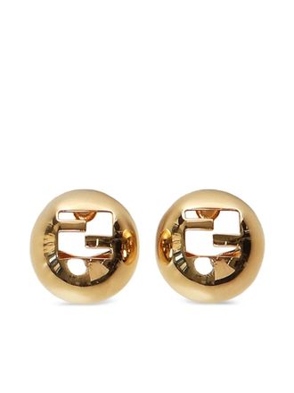 Fendi logo-cut sphere earrings - Yellow