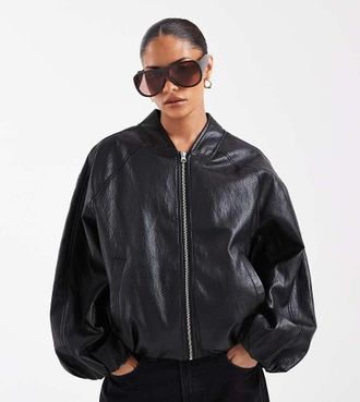 Asos Petite ASOS DESIGN - Giacca bomber oversize in pelle sintetica lavaggio nero slavato