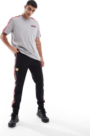 adidas adidas Football - Manchester United Icons - Pantaloni sportivi neri e rossi-Nero