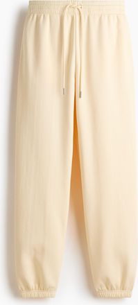 H&M Sweatpants aus Baumwollmix - Yellow