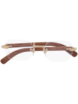 Cartier Bril met randloos montuur - Bruin
