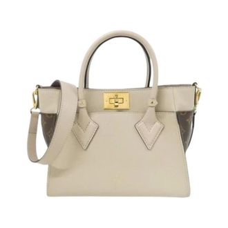 Louis Vuitton Pre-owned Vintage Canvas Handtas - Dames - Pre-owned - Beige - Maat: ONE Size Leer