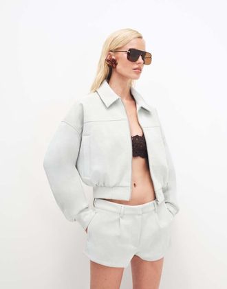 Cernucci Giacca bomber in camoscio sintetico azzurro con colletto in coordinato-Blu