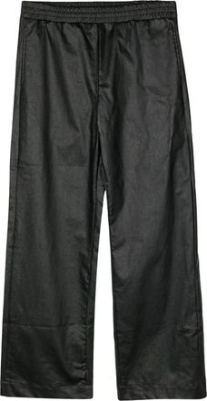 Walter Van Beirendonck Two-tone graphic print trousers