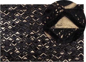 Beliani Beliani - Alfombra De Piel Negra Y Dorada 140 X 200 Cm Estilo Moderno Glam Develi