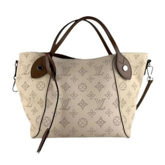 Louis Vuitton Pre-owned Mahina Handbag - Dames - Pre-owned - Beige - Maat: ONE Size Leer