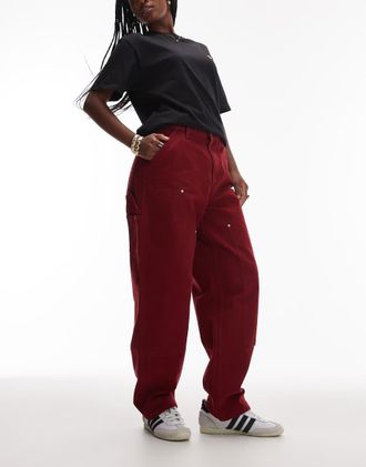 Carhartt Work in Progress OG - Pantaloni color rosso intenso con ginocchia doppiate