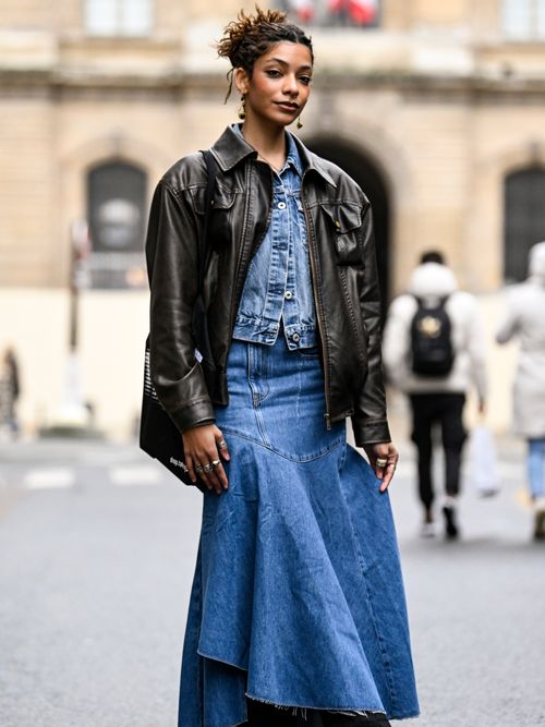 Cecile Inchauspe is seen wearing a Nuth Official jacket, vintage denim jacket, Maje denim skirt, black trousers outside the Maje presentation during the Womenswear Fall/Winter 2024/2025 as part of Paris Fashion Week on February 29, 2024 in Paris, France.
