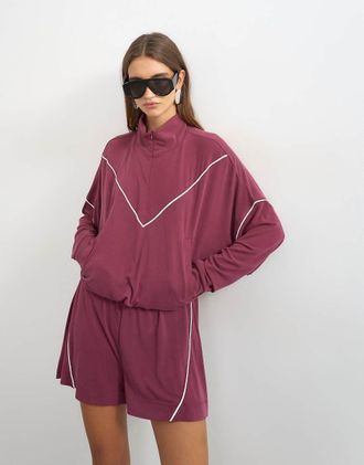 Topshop top coordinato sportivo con profili a contrasto e mezza zip in bordeaux-Rosso