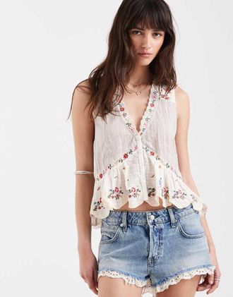 Free People Ellis - Blusa color avorio con fiori ricamati-Bianco
