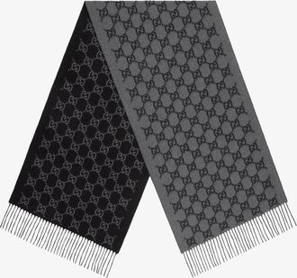 Gucci Sciarpa realizzata in jacquard di cashmere GG e impreziosita da finiture con frange. - GUCCI - gender_Man