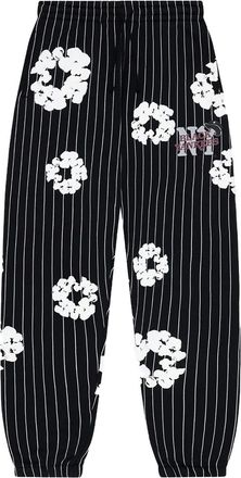 Denim Tears Gestreepte trainingsbroek verfraaid met bloemen - Zwart