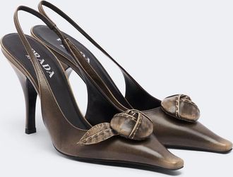 Prada Salones destalonados de piel con aplique floral