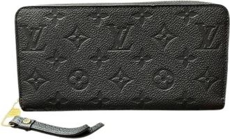Louis Vuitton Vintage, unisex, Zwart, ONE Size, Leer, Pre-owned Zippy Wallet Empreinte Lange Portemonnee