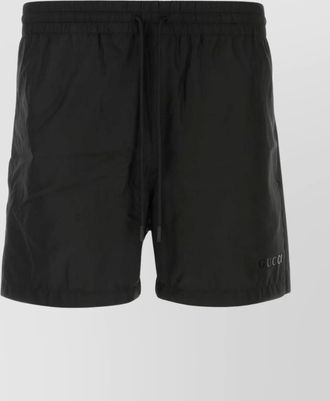Gucci polyester swim shorts with elastic waistband and back pocket