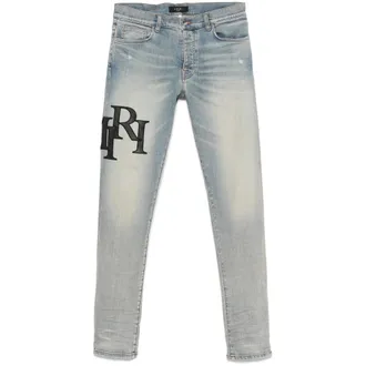 Amiri Staggered Logo Skinny Jeans