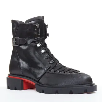 Christian Louboutin flat coated canvas boots
