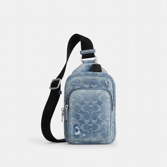 Coach Racer Sling Pack In Loved Signature Denim