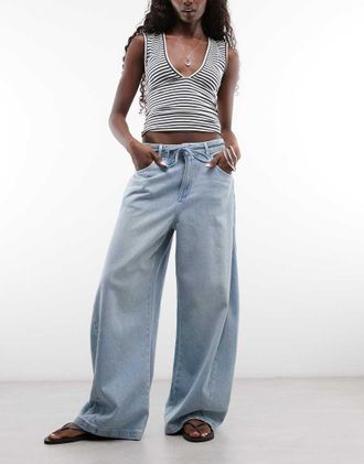 Reclaimed Vintage jeans baggy wide in denim con dettaglio annodato lavaggio azzurro chiaro-Blu