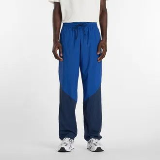New Balance Hombre Sport Legacy Pant en Azul, Nylon, Talla 2XL