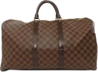 Louis Vuitton Pre-owned Weekend Bags, female, Brown, Size: ONE SIZE Pre-owned Canvas handbags