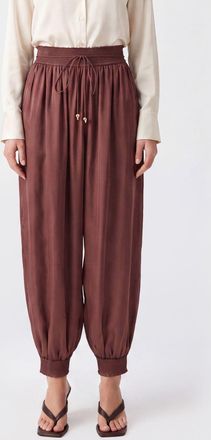 Zimmermann Pantaloni Aster a gamba larga in seta con vita alta