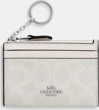Coach Mini Skinny Id Case In Signature Canvas