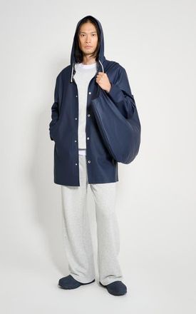 Stutterheim Stockholm Long Sleeve Hooded Raincoat in Navy at Nordstrom, Size X-Large